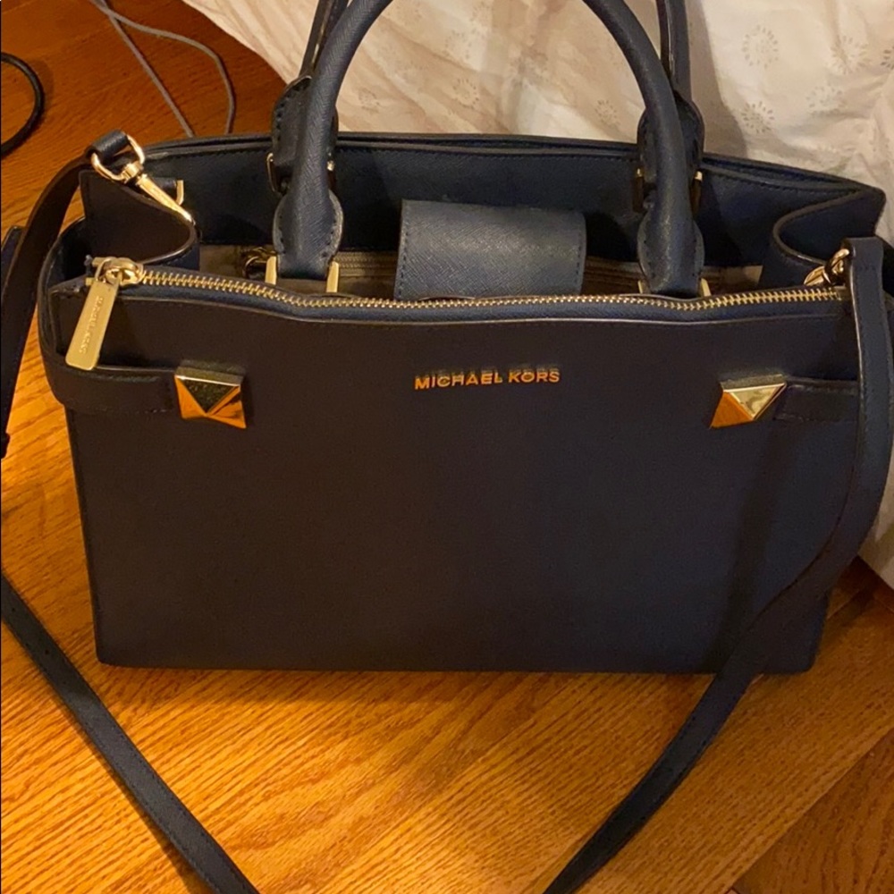 Large Micheal Kors navy blue purse with crossbody strap